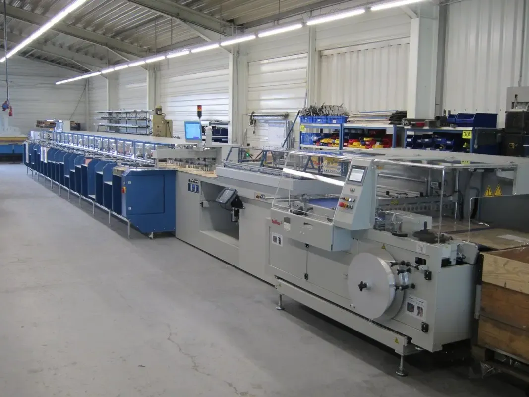 Close-up of a Post Press Systems collating machine